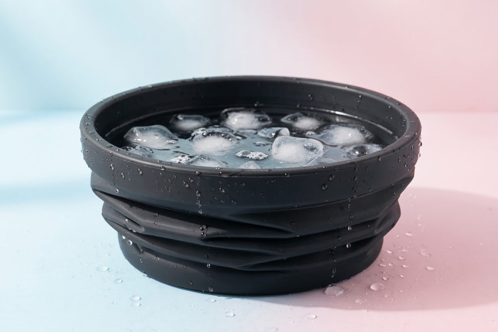 Foldable silicone facial ice bowl folded flat for travel storage